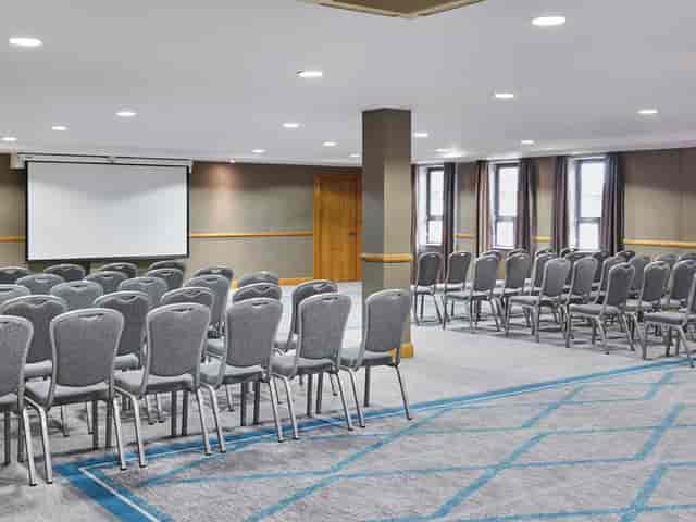 Crowne Plaza Belfast Grand Ballroom: theater-style meeting room for corporate training events.
