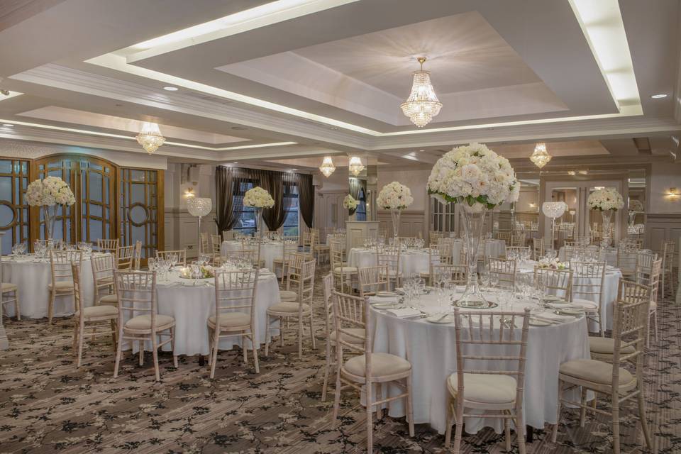 Malone Suite banquet setup with elegant floral decor for corporate galas and social events.