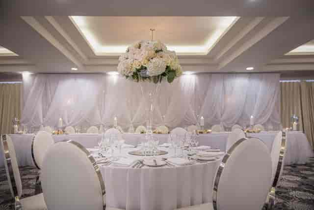 Laganview Suite gala setup with floral centerpiece for upscale formal events and weddings.