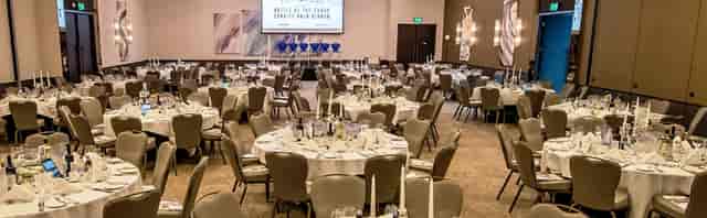 Ballroom gala setup with stage at Hilton Southampton, ideal for professional corporate events.