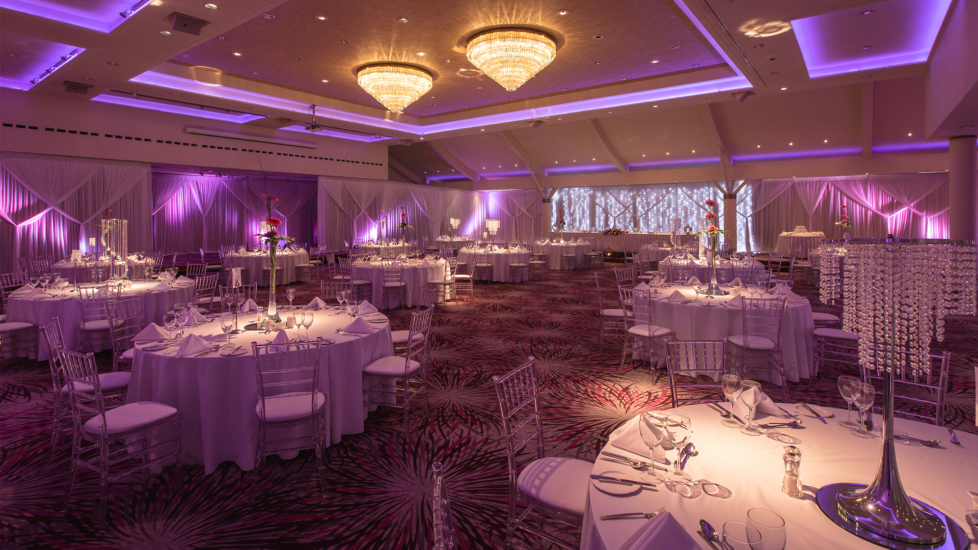 Grand Ballroom at Stormont Hotel with crystal chandeliers for gala and wedding event hire.