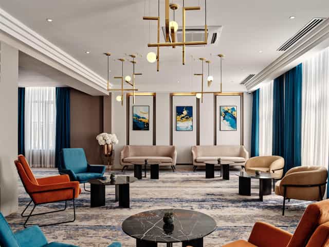 Sophisticated Tashkent Plaza pre-function area for upscale corporate events and business meetings.
