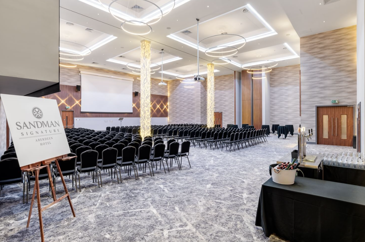 Robert Gordon Ballroom in Sandman Signature Aberdeen featuring theater-style conference seating.