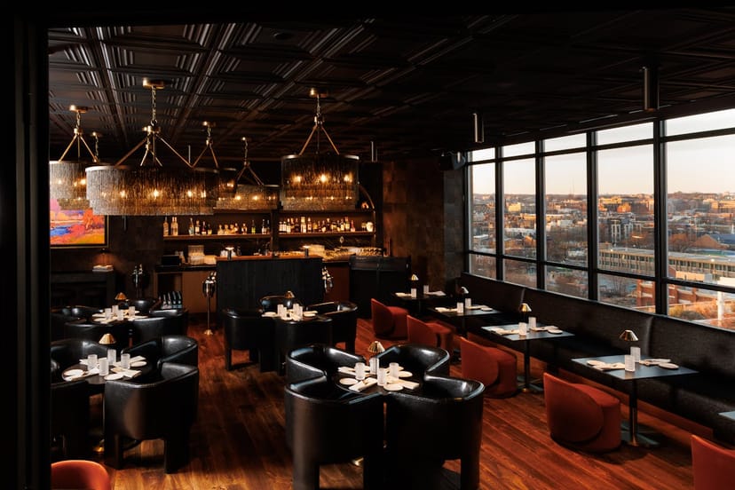 Main Indoor Lounge at Realm Rooftop Bar with city views for upscale networking receptions.
