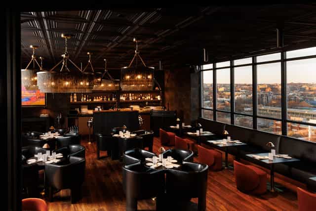 Moody Realm Rooftop Terrace for upscale corporate cocktail receptions and networking events.