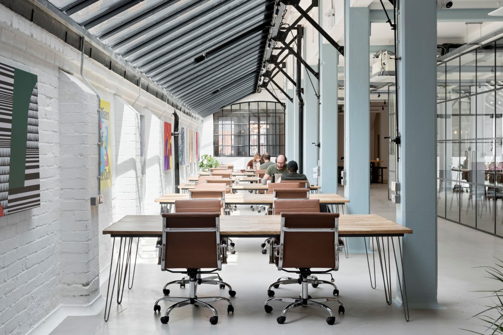 The Press Room co-working space with natural light for creative workshops and team sessions. - Banner