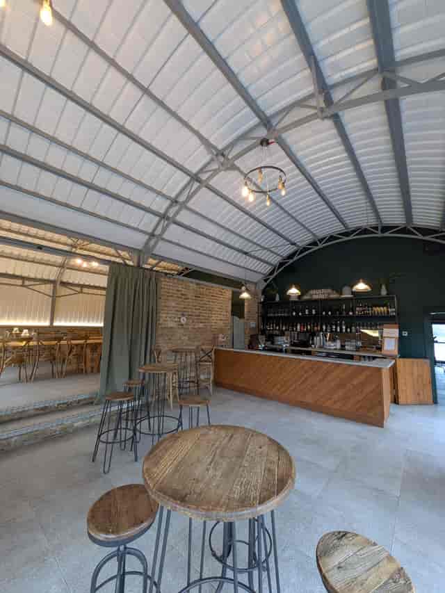 Boulton & Paul Bar at The Barns: Industrial-chic event venue for networking and conferences.