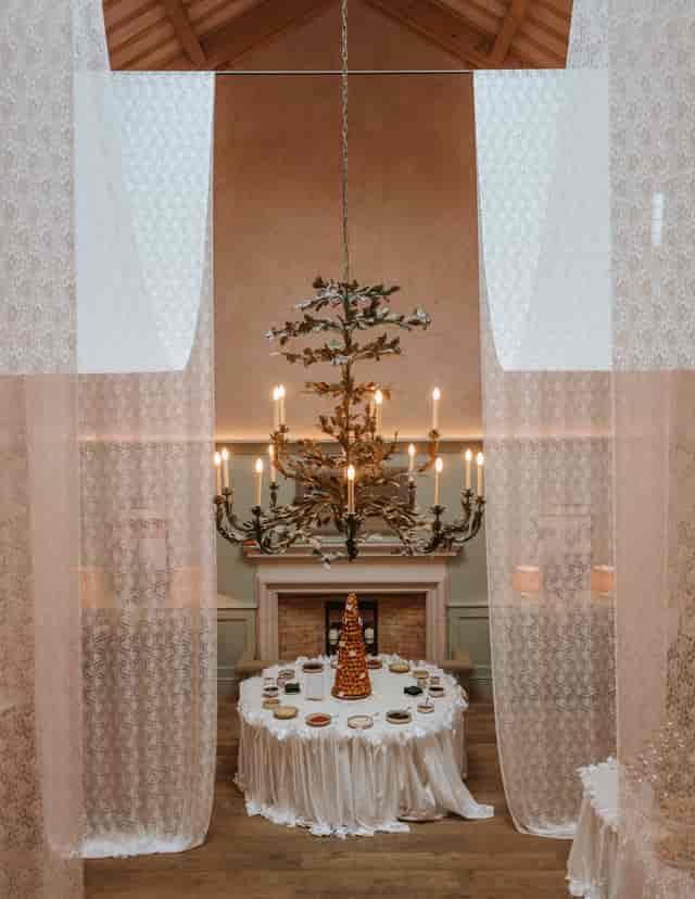 Hearth Room at Kin House with floral chandelier for luxury gala or reception venue.