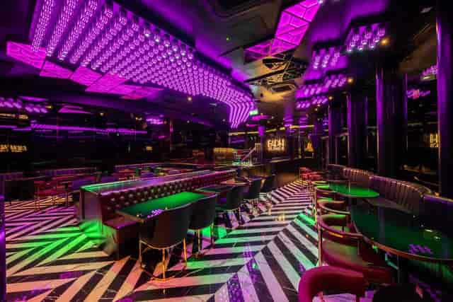 Modern lounge venue with LED lighting for corporate events and evening receptions.