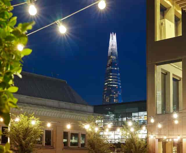 Rooftop terrace venue in London with city skyline view for premium networking and evening events.