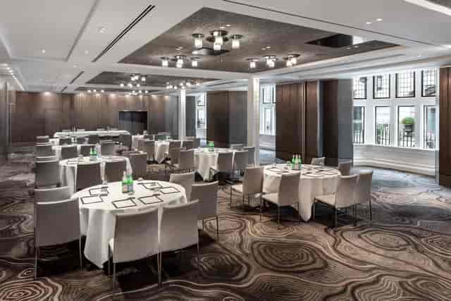 Folio Suite ballroom with modern lighting, perfect for gala dinners and corporate networking.