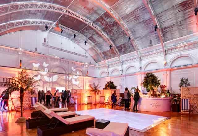 Beach club brand activation in historic Lindley Hall with modular lounge furniture for corporate events.