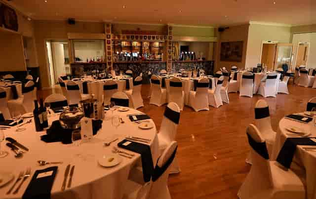 Havant Rugby Club function room with round tables for formal dinners and corporate events.