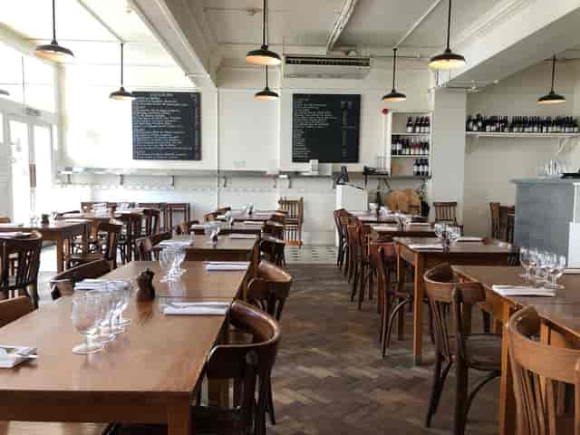 St. John Bread & Wine restaurant venue with modular seating for corporate events and dinners.