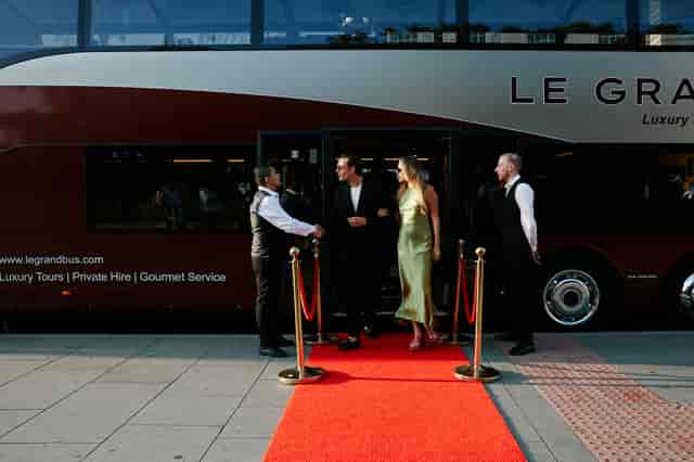 Luxury mobile event venue with red carpet arrival service for VIP corporate and wedding events.