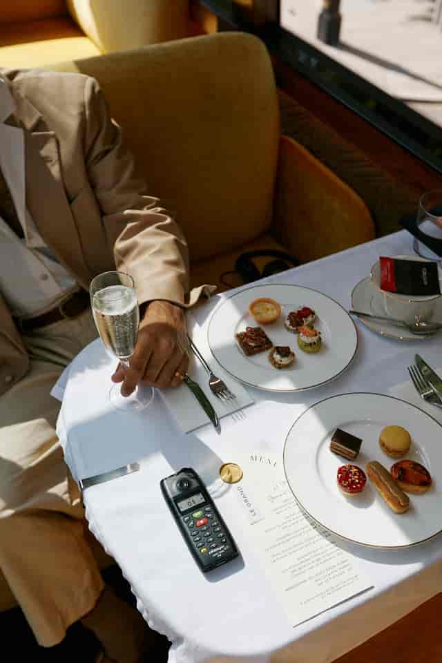 Luxury corporate networking event in Le Grand Bus with premium catering and elegant setup.