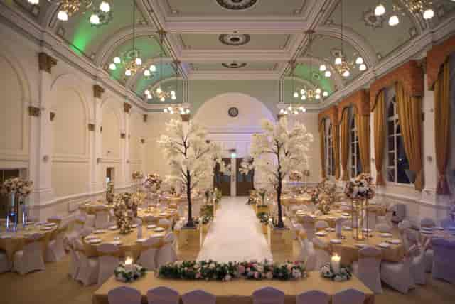 Leyton Green wedding venue with grand ballroom, illuminated aisle, and statement trees.