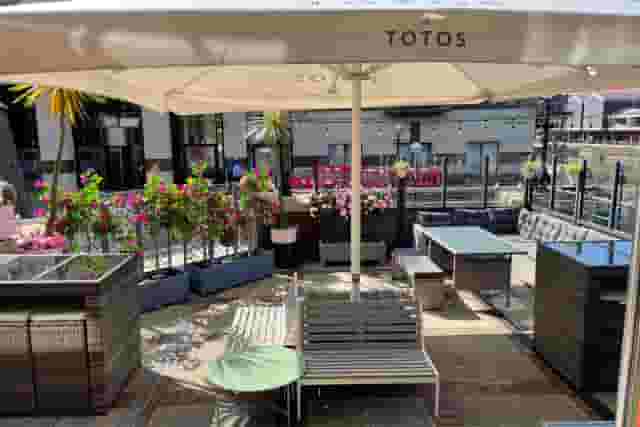 Totos by the River