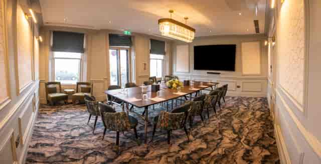 Blenheim Suite boardroom with natural light for executive meetings and corporate events.