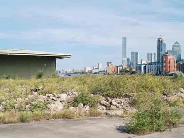 The Storehouse Deptford venue with Canary Wharf skyline for corporate events and festivals.
