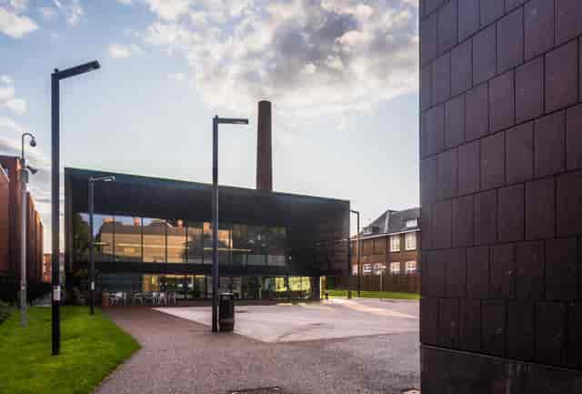 Industrial-chic Hub courtyard at Bernie Grant Arts Centre for corporate events and networking.
