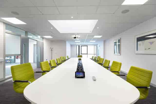 Modern boardroom with integrated tech for executive meetings at DCU St. Patrick's Campus.