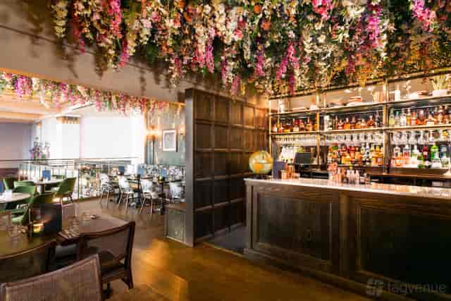 The Clopton Room at Swan's Nest Hotel: floral ceiling venue for cocktail receptions and events.