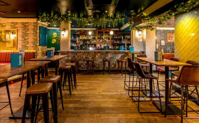 Uptown at Barrio Shoreditch: high-top seating for networking events and team socials.