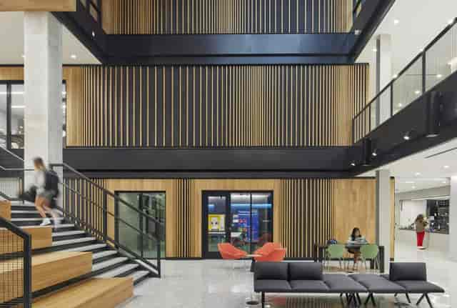 Modern multi-level atrium at Main Room Lafayette for corporate networking and event registration.