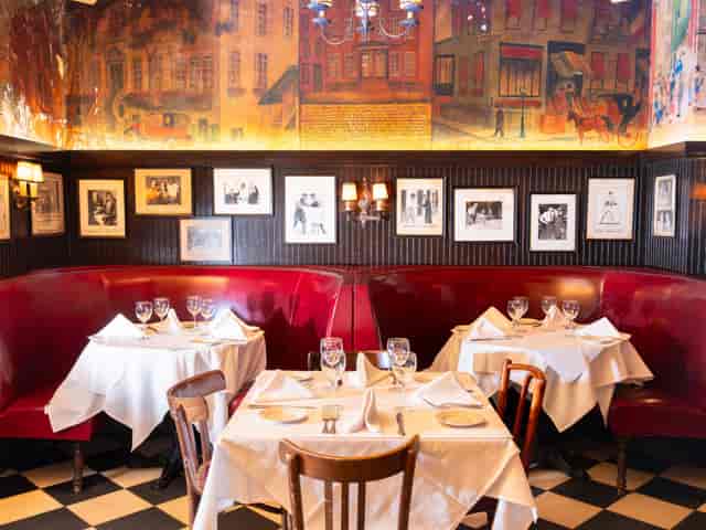 Lafayette Main Room: Intimate networking venue with bistro seating for corporate events and dinners.