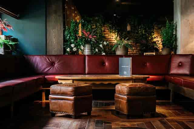 Welcome Lounge at The Lamp House with warm lighting for networking and corporate events.