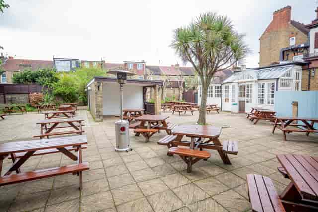 Public Bar at The Foresters: High-capacity courtyard for corporate networking and team socials.