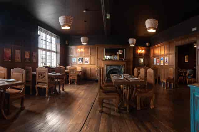 Wood-paneled private dining room at The Elephant Inn for corporate dinners and networking events.