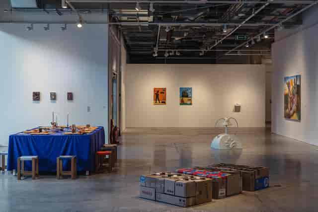 Main Gallery event space with blue dining setup for corporate and private hire.
