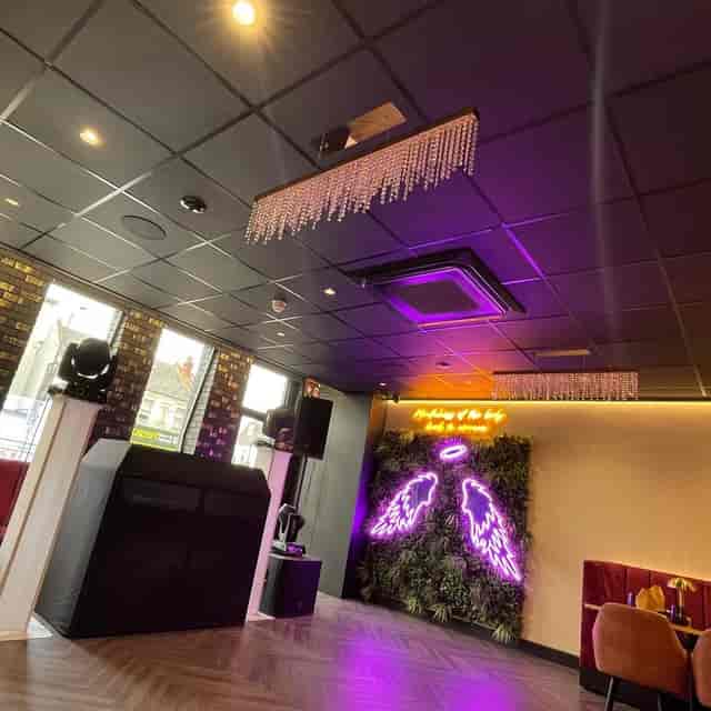 Nirvana Lounge private dining room with neon lighting for evening mixers and brand activations.