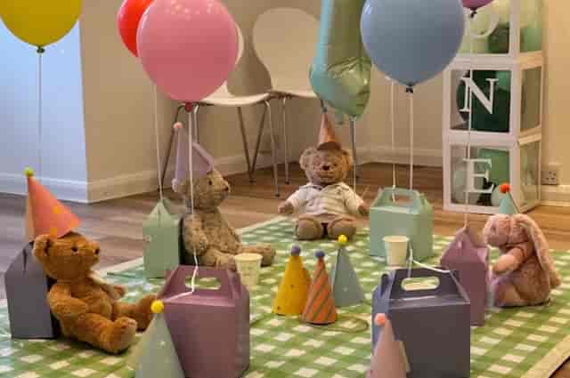 First birthday party banquet setup with floor seating at Studio Hire Cobham for soft play events.