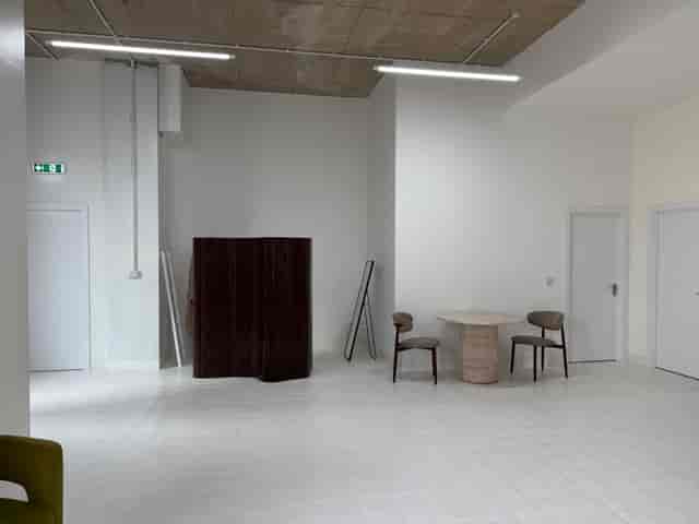 Industrial studio venue for boutique pop-up events and creative workshops.