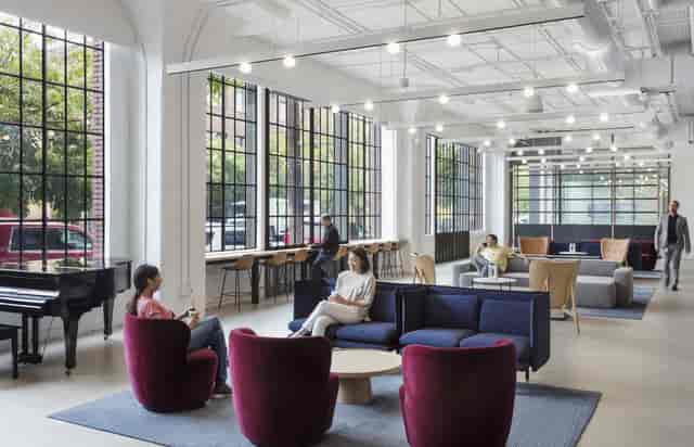 Nurture Room breakout space with modular lounge seating for corporate networking and events.