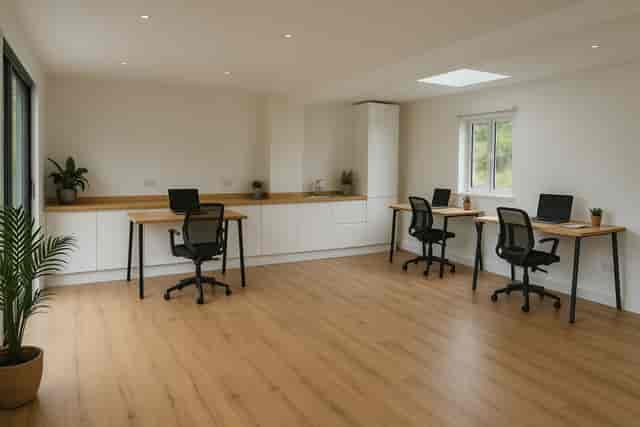 Minimalist Nurture Room for focused breakout sessions and professional co-working events.