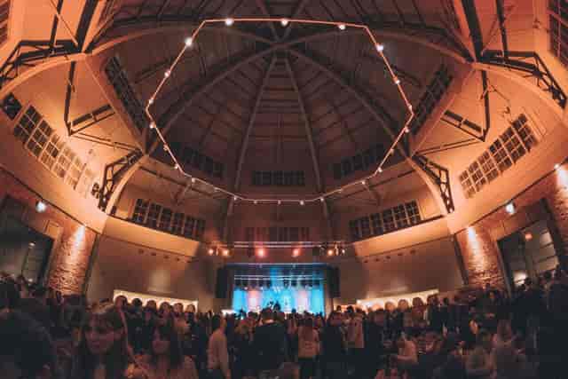 Wylam Brewery vaulted event venue featuring a central stage for large galas and receptions.