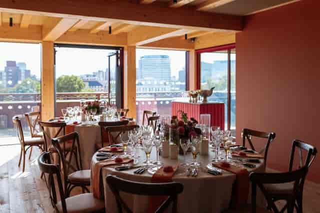 The Old Vic event space with elegant dining setup for high-end corporate or social dinners.