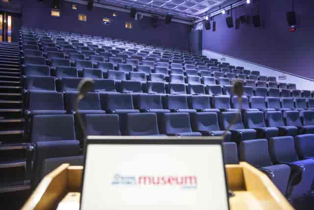 RAF Museum London lecture theatre with branded lectern for corporate events and presentations.