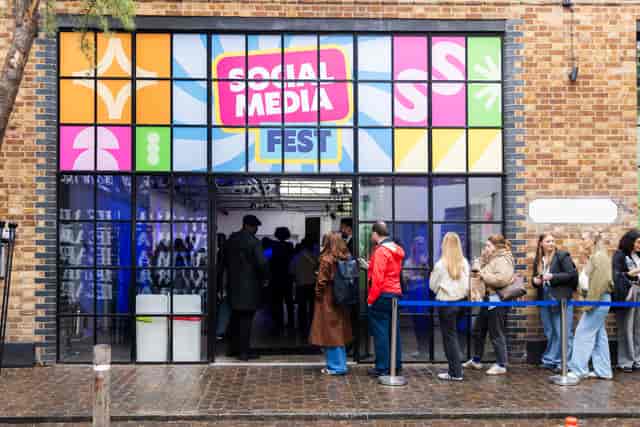 Branded entry with window decals at Protein Studios for consumer activation and product launch.