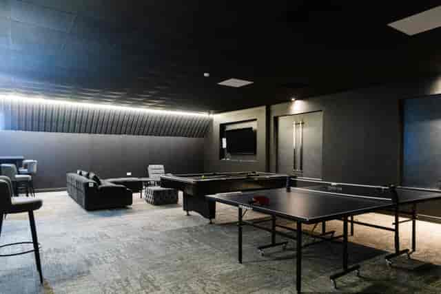 Dark Knight Suite at FOMO Lounge: low-key breakout area for team building and networking events.