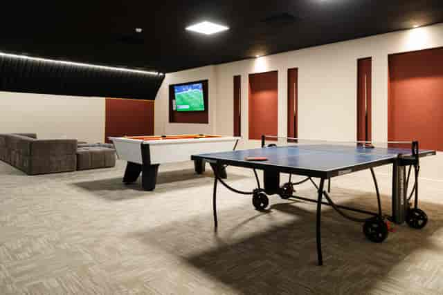 Gladiator Suite at FOMO Lounge: lounge seating for corporate teambuilding and networking events.