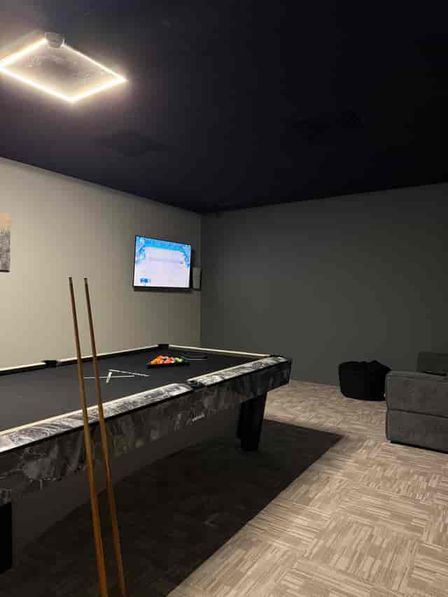 Rush Hour Suite pool table at FOMO Lounge for networking and team-building events.