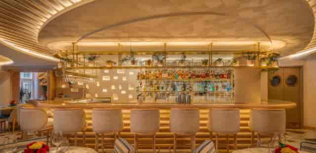 NAMMOS London first floor bar for upscale cocktail receptions and VIP events with ambient lighting.