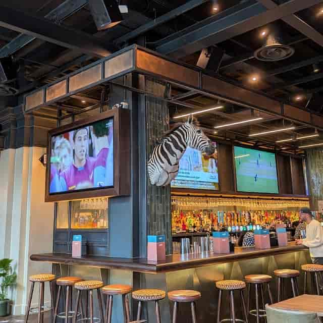 Semi-private bar area in Ludo Cardiff, perfect for corporate networking and social mixers.