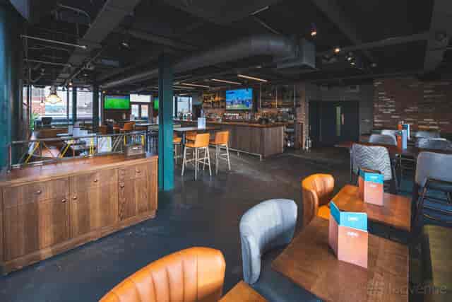 Industrial-chic Ludo Sports & Live Lounge Exeter venue for networking and team socials.