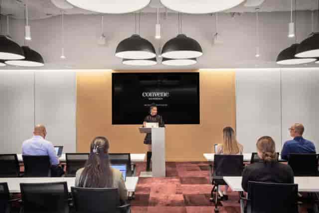 Corporate training classroom at Structure Wellness with AV setup for professional events.